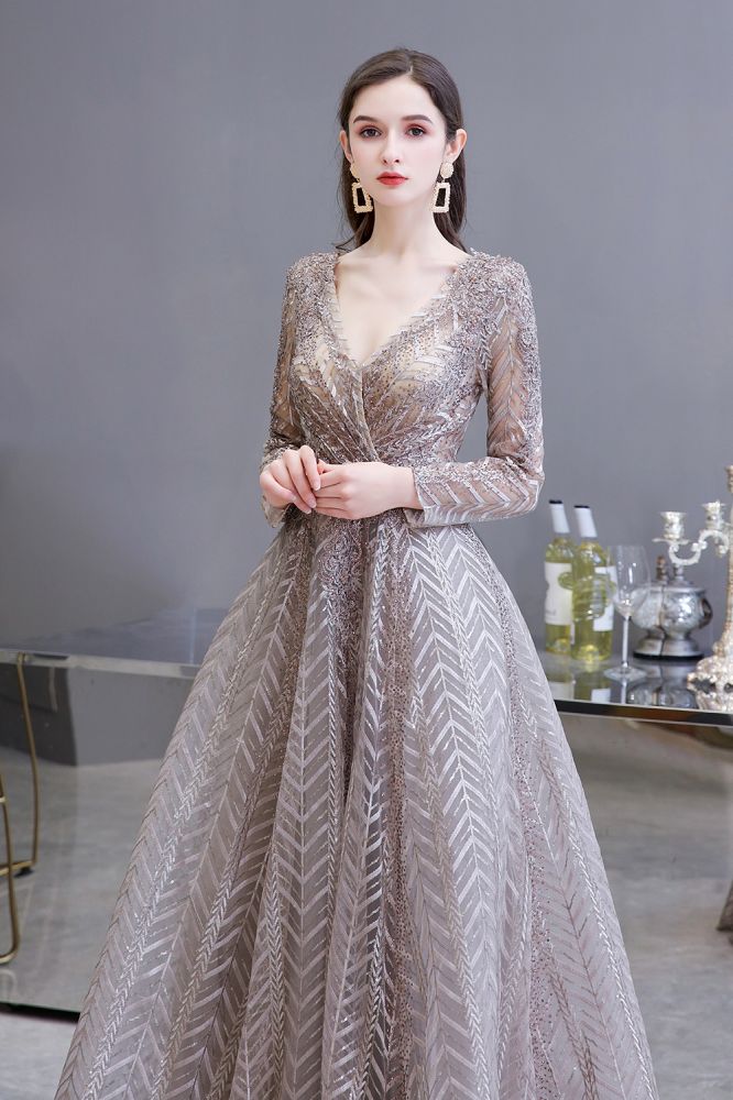 Looking for Prom Dresses, Evening Dresses, Homecoming Dresses, Quinceanera dresses in Tulle, Lace,  A-line style,  and Gorgeous Draped, Pearls, Sequined, Rhinestone work? stylesnuggle has all covered on this elegant Modest Long Sleevess V-neck Princess Prom Dress.