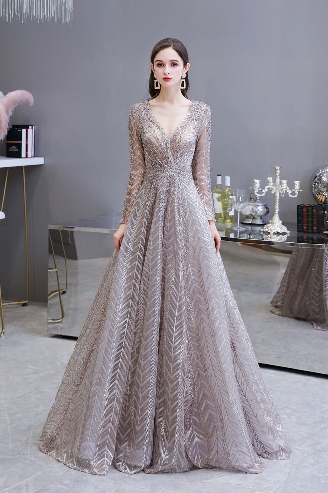 Looking for Prom Dresses, Evening Dresses, Homecoming Dresses, Quinceanera dresses in Tulle, Lace,  A-line style,  and Gorgeous Draped, Pearls, Sequined, Rhinestone work? stylesnuggle has all covered on this elegant Modest Long Sleevess V-neck Princess Prom Dress.