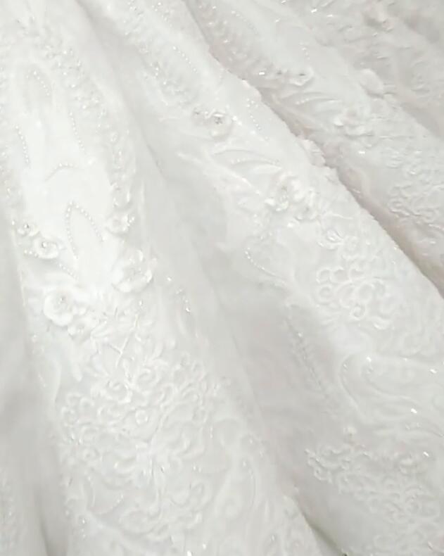 Inspired by this wedding dress at stylesnuggle.com,Mermaid style, and Amazing Crystal work? We meet all your need with this Classic latest V Neck Cap Sleeve Beads Crystals Mermaid Wedding Dress Lace Applique.