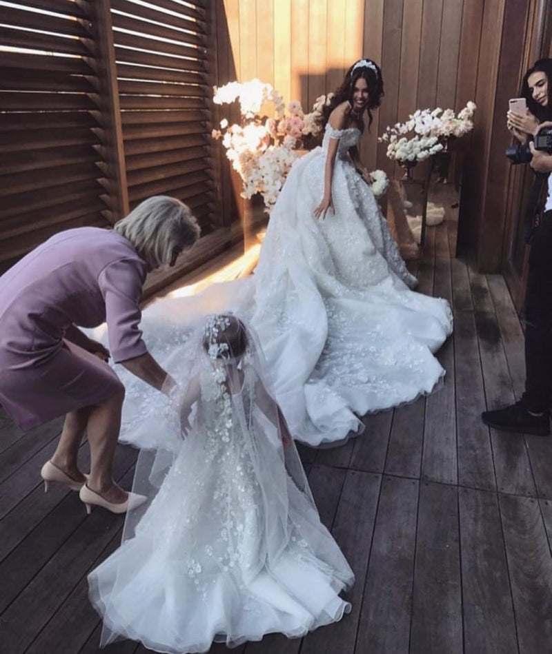 stylesnuggle custom made this off the shoulder appliques princess wedding dress in high quality, we sell dresses online all over the world. Also, extra discount are offered to our customs. We will try our best to satisfy everyoneone and make the dress f