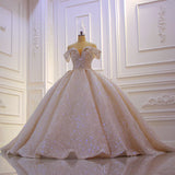 stylesnuggle custom made you this Off the shoulder Champange Puffy ball Gown Sparkle Wedding Dress comes in all sizes and colors. Welcome to pick the most fabulous style today, extra coupons to save a lot.