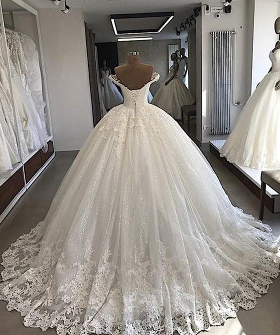 stylesnuggle offers beautiful Off-the-shoulder Lace Bridal Gowns online. Get this for your big day to shock everyone wedding guests.