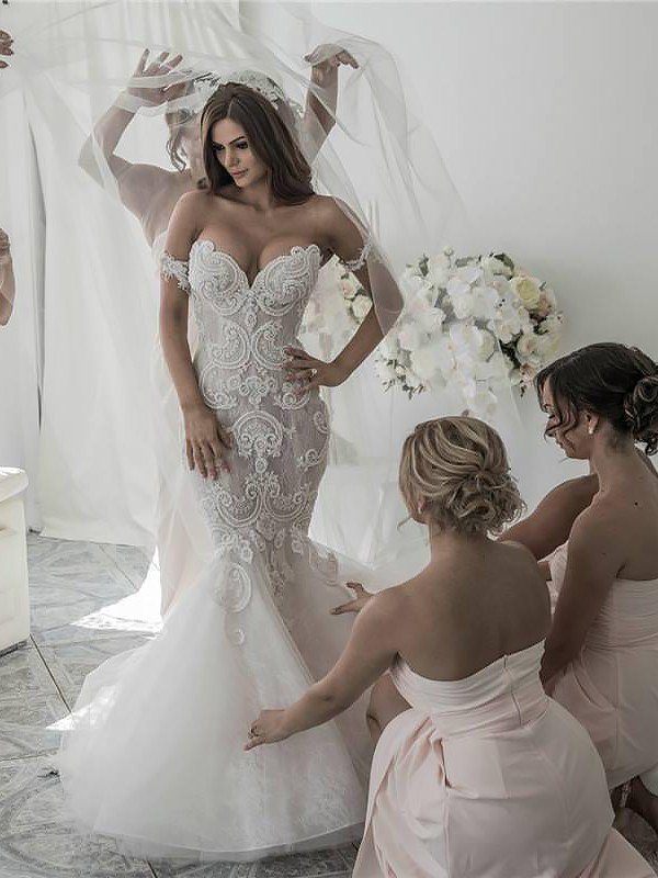 This Sleeveless Mermaid Tulle Chapel Train Wedding Dresses at stylesnuggle.com will make your guests say wow. The Off-the-shoulder bodice is thoughtfully lined, and the skirt with to provide the airy.