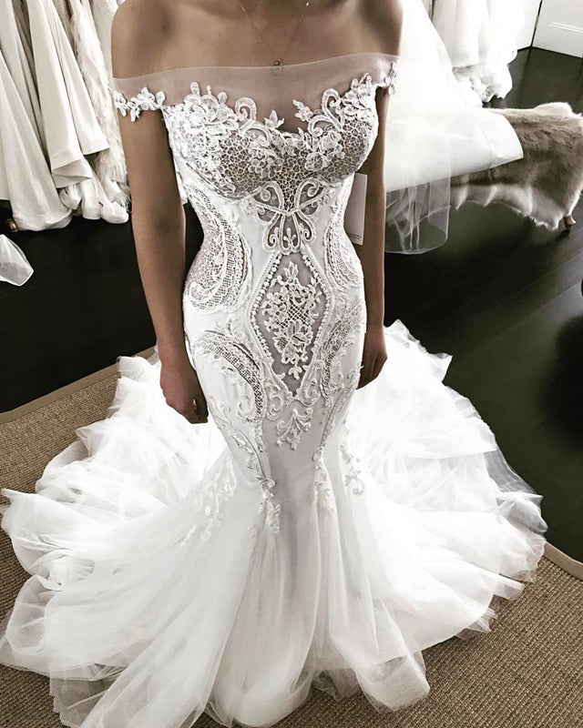 stylesnuggle.com supplies you Off-the-shoulder Strapless Mermaid Lace Wedding Dress at reasonable price. Fast delivery worldwide. 