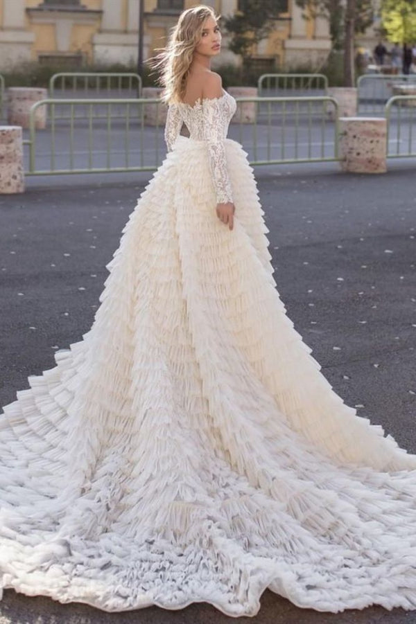 Inspired by this wedding dress at stylesnuggle.com,A-line style, and Amazing work? We meet all your need with this Classic Off the Shoulder Wedding Gown Long Sleeves Floral Mermaid with Detachable Train.