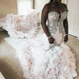 stylesnuggle offers Plus Size Mermaid Crystal Lace Beads Sweetheart Long Train African Custom Made Ruffless Wedding Dresses online at an affordable price from Satin,Taffeta,Hard Net to Ball Gown Floor-length skirts. Shop for Amazing Sleeveless wedding collections for your big day.