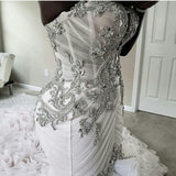 stylesnuggle offers Plus Size Mermaid Crystal Lace Beads Sweetheart Long Train African Custom Made Ruffless Wedding Dresses online at an affordable price from Satin,Taffeta,Hard Net to Ball Gown Floor-length skirts. Shop for Amazing Sleeveless wedding collections for your big day.