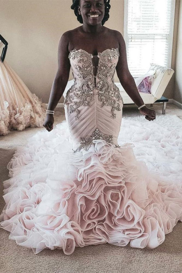 stylesnuggle offers Plus Size Mermaid Crystal Lace Beads Sweetheart Long Train African Custom Made Ruffless Wedding Dresses online at an affordable price from Satin,Taffeta,Hard Net to Ball Gown Floor-length skirts. Shop for Amazing Sleeveless wedding collections for your big day.