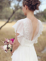 Check this Ruched Floor-Length A-Line V-neck Chiffon Short Sleeves Wedding Dresses at stylesnuggle.com, this dress will make your guests say wow. The V-neck bodice is thoughtfully lined, and the Floor-length skirt with Ruched to provide the airy, flatter look of 100D Chiffon,Lace.