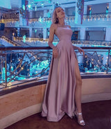 stylesnuggle offers Simple Halter Backless Dusty Pink High split Long evening Dresses On Sale at an affordable price from Stretch Satin to Column Floor-length skirts. Shop for gorgeous Sleeveless Prom Dresses, Evening Dresses collections for your big day.