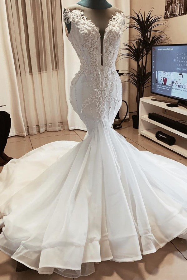 This Sleeveless Beads Appliques Mermaid Wedding Dresses Sheer Tulle V-neck Tulle Bridal Gowns at stylesnuggle comes in all sizes and colors. Shop a selection of formal dresses for special occasion and weddings at reasonable price.