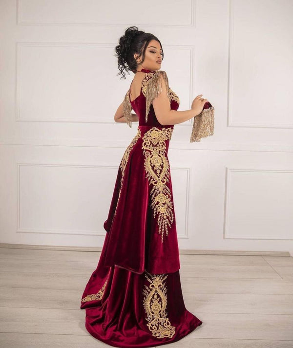 stylesnuggle offers Sleeveless Velvet Burgundy Mermaid Prom Party GownsTassel Gold Appliques Evening Gown with Front Split at a good price from Velvet to Mermaid hem. Gorgeous yet affordable Sleeveless Prom Dresses, Evening Dresses.