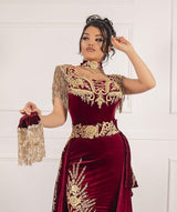 stylesnuggle offers Sleeveless Velvet Burgundy Mermaid Prom Party GownsTassel Gold Appliques Evening Gown with Front Split at a good price from Velvet to Mermaid hem. Gorgeous yet affordable Sleeveless Prom Dresses, Evening Dresses.