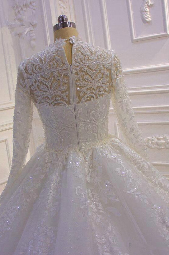 Wanna get a dress in Tulle, Ball Gown style, and delicate Lace,Beading,Appliques,Ruffless work? We meet all your need with this Classic Sparkle Lace Ball Gown High Neck Tull Long Sleevess Wedding Dress at factory price.