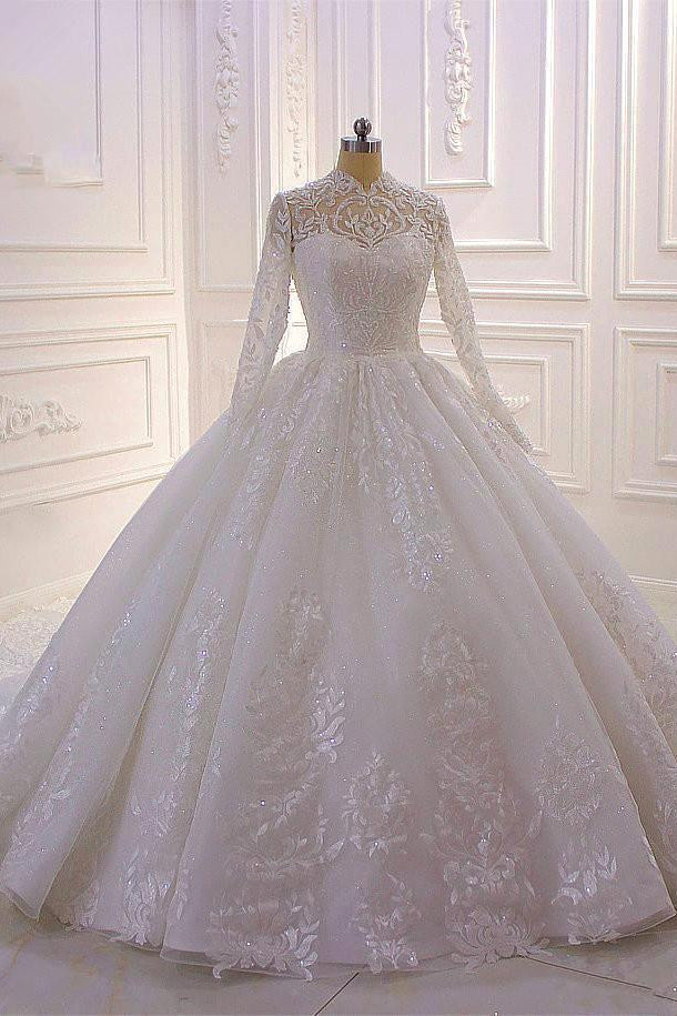 Wanna get a dress in Tulle, Ball Gown style, and delicate Lace,Beading,Appliques,Ruffless work? We meet all your need with this Classic Sparkle Lace Ball Gown High Neck Tull Long Sleevess Wedding Dress at factory price.