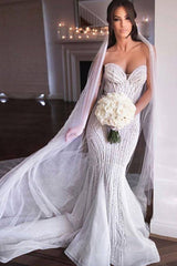 This Strapless Sweetheart Beads Mermaid Wedding Dresses Appliques Tulle Bridal Gowns at stylesnuggle comes in all sizes and colors. Shop a selection of formal dresses for special occasion and weddings at reasonable price.