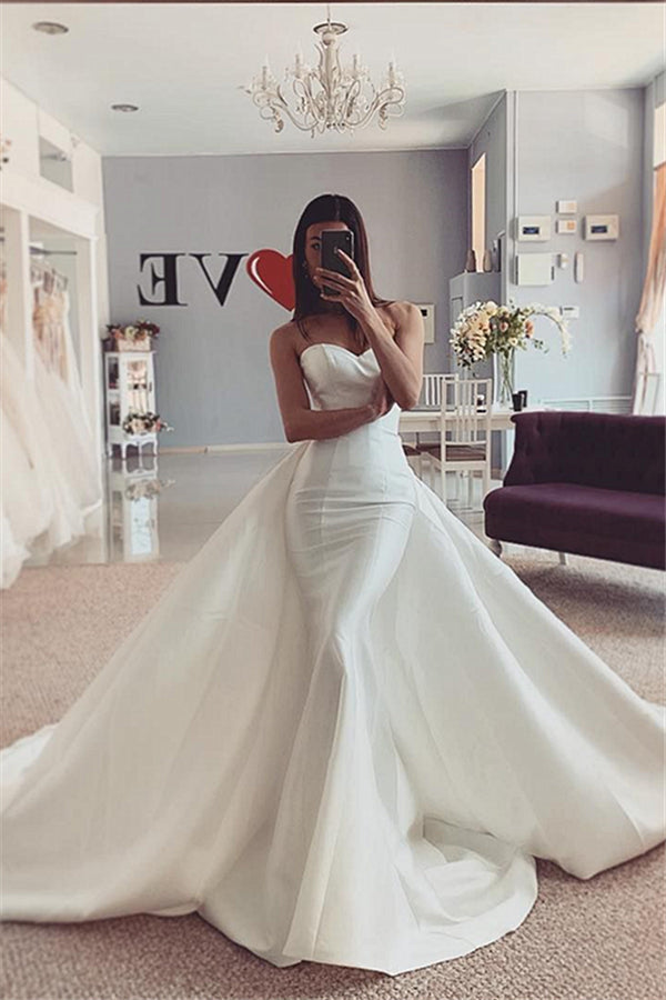 stylesnuggle.com supplies you Strapless White Mermaid Wedding Dress with trendy overskirt at reasonable price. Fast delivery worldwide. 