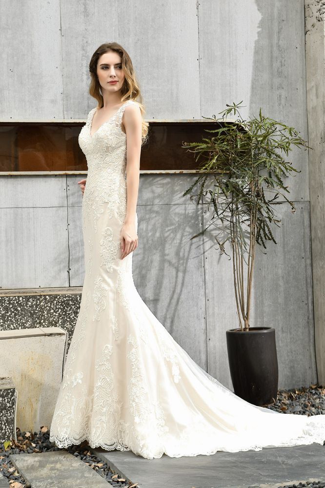 Can't decide what to wear for your big day. stylesnuggle has Fit-and-flare Lace Open Back Beach Wedding Dress avilable in White, Ivroy and champange. Try this simple bridal gowns for your summer wedding.