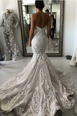 stylesnuggle.com supplies you Stunning Sweetheart Ivory Mermaid Lace Wedding Dress Online at reasonable price. Fast delivery worldwide. 