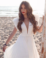 stylesnuggle offers White Chiffon Ruffless Sleeves V-neck Summer Beach Wedding Dress at factory price from White,Ivory,Champagne,Black, 100D Chiffon to A-line Floor-length hem. All sold at reasonable price