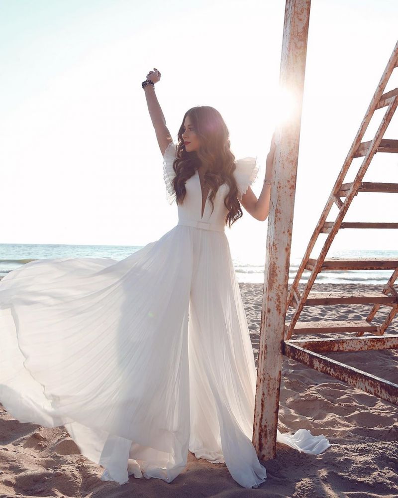 stylesnuggle offers White Chiffon Ruffless Sleeves V-neck Summer Beach Wedding Dress at factory price from White,Ivory,Champagne,Black, 100D Chiffon to A-line Floor-length hem. All sold at reasonable price