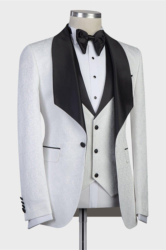 stylesnuggle custom made this White Three-pieces Jacaquard Wedding Groom Suits with Black Shawl Lapel with rush order service. Discover the design of this White Jacquard Shawl Lapel Single Breasted mens suits cheap for prom, wedding or formal business occasion.